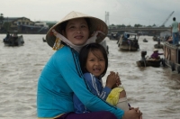 Cai Rang Floating Market - 32 year old Thuy ("Water") and 7 year old daughter Diem ("Beauty")